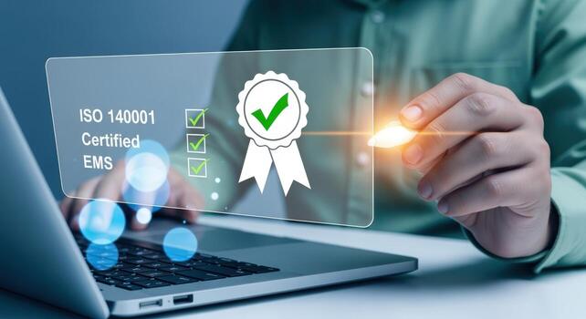 ISO 14001 Certification Concept Man using Laptop for Environmental Management System Compliance and Standard Assurance photo