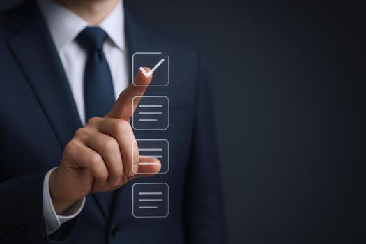 Businessman Ticking Off a Task on a Digital Checklist, Illustrating Project Management and Accomplishment photo