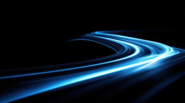 Abstract light trails on black background conveying speed, energy, and forward motion in vibrant blues photo