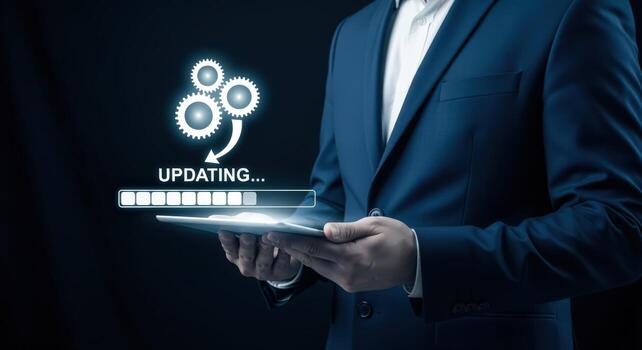 Businessman Holding Tablet with Update Progress, System Maintenance, Software Upgrade, and Technology Concept photo