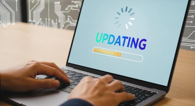Laptop Screen Displaying Software Update Progress, Hands Typing on Keyboard, Technology Concept photo