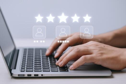 Customer Feedback Concept Person Typing on Laptop with Review Stars and User Icons Overlay photo