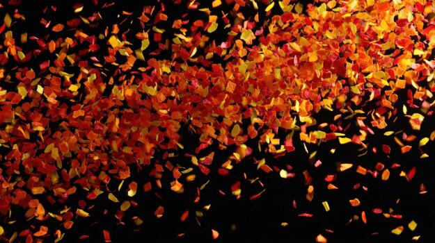 Autumnal Cascade of Colorful Leaves Against Dark Background Seasonal Transition, Natures Palette, Abstract Design photo
