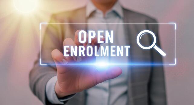 Open Enrollment Concept Person Touching Virtual Interface with Text and Magnifying Glass Symbol photo