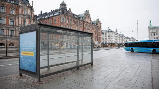 Cityscape View with Bus Stop on a Cloudy Day, Featuring Modern Architecture and Public Transportation photo