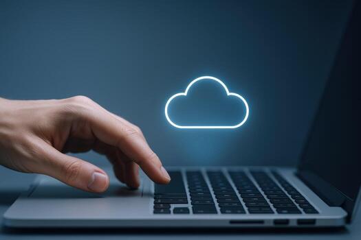 Cloud Computing Hand Interacting with Laptop Displaying Cloud Icon for Data Storage and Connectivity photo