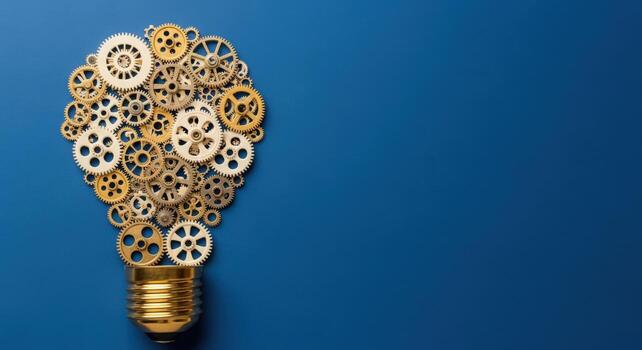 Gear Lightbulb Concept on Blue Background Innovation, Invention, and Technological Advancement Visual photo