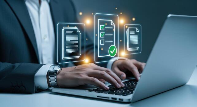 Businessman Completing Digital Checklist on Laptop with Glowing Icons Representing Tasks and Documents photo