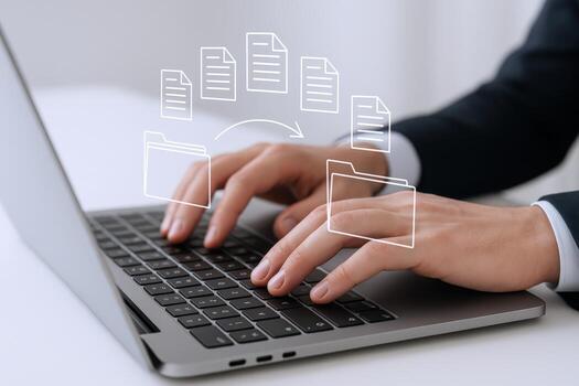 Data Migration Process Businessman transferring files and documents on laptop, emphasizing data management and digital transformation photo