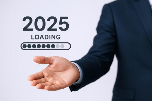 Anticipating 2025 Businessman Gesturing Towards Progress with Loading Bar Symbolizing Future Expectations and Business Growth photo