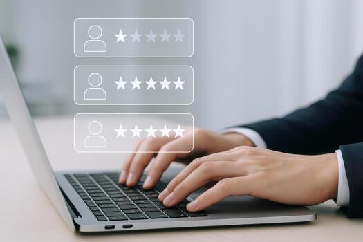 Online Review System Customer Feedback Interface on Laptop Showing Star Ratings and User Profiles photo