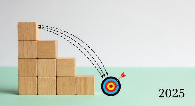 Goal Setting for 2025 Wooden Blocks Stacked Towards a Target, Illustrating Growth and Achievement photo