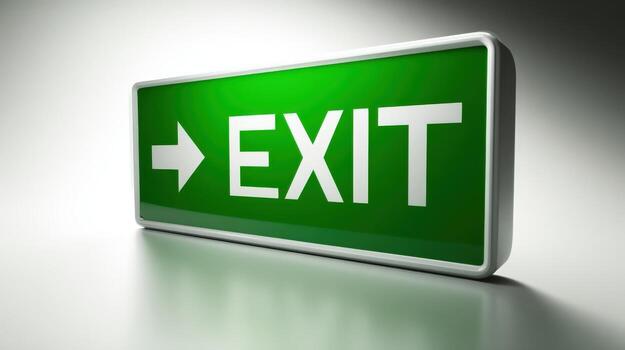 Illuminated Green Exit Sign with Arrow Indicates Emergency Evacuation Route for Safety and Security photo