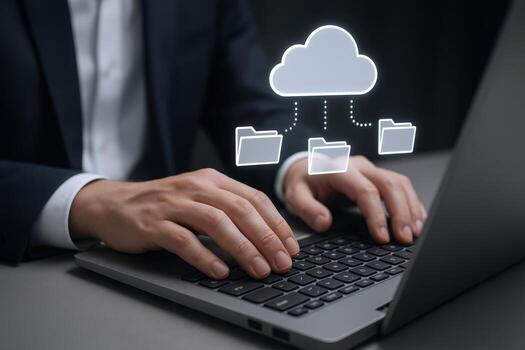 Cloud Computing and Data Management Professional Using Laptop for Online Storage and File Sharing photo