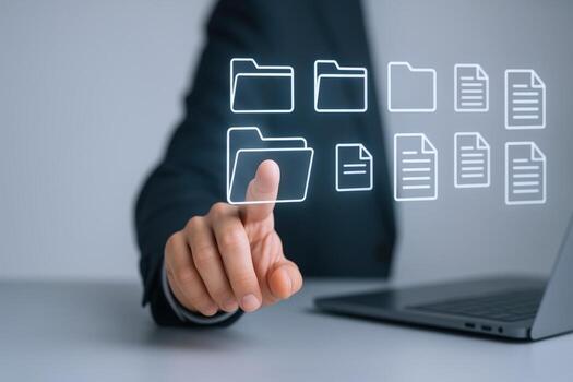 Data Management Business Professional Organizing Files with Digital Interface on Laptop for Efficiency photo