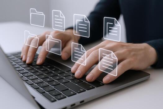 Data Management Concept Hands Typing on Laptop with Digital Files and Folders Overlay photo