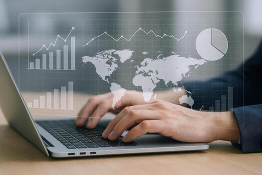 Data Analysis Visualization Businessman Analyzing Worldwide Statistics and Financial Trends on Laptop with Overlay Graphics photo