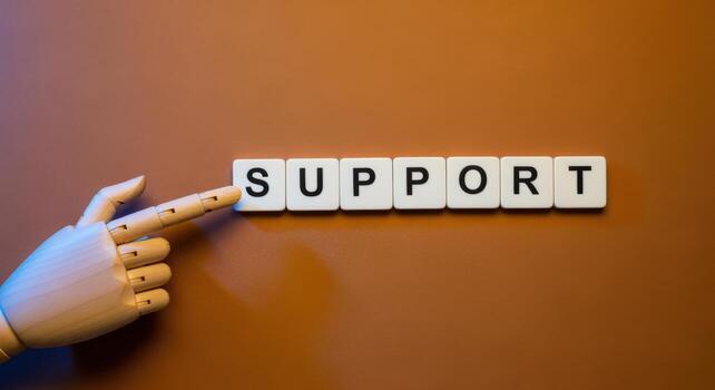 Conceptual Image Featuring Support Spelled Out with Wooden Hand Assistance on Brown Background photo