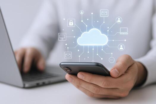 Cloud Computing Technology Person Using Smartphone for Cloud Access and Data Management with Laptop photo