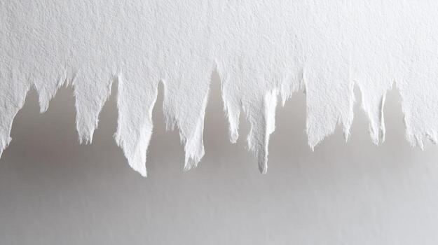 Torn White Paper Edge with Rough Texture, Suitable for Creative Design and Abstract Backgrounds photo