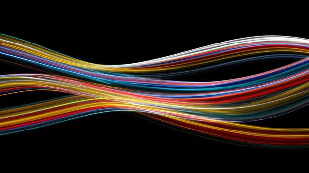 Dynamic Multi-Colored Light Streaks Against Black Backdrop Creating Abstract Art for Modern Visuals photo