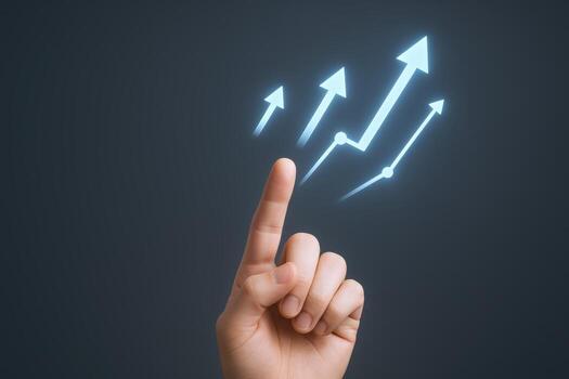 Hand Touching Glowing Arrows Symbolizing Growth and Success on a Dark Background photo