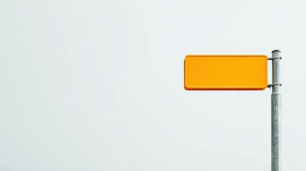 Bright Yellow Sign on Metal Pole Against a Plain White Background, Ideal for Custom Text photo