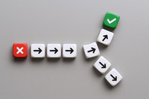 Decision Point Cubes showing diverging paths from wrong to right, success concept photo