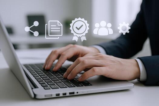 Professional using laptop to access quality assurance, compliance, and data management resources efficiently photo