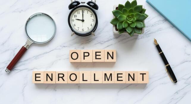 Open Enrollment Arrangement with Clock, Magnifier, Pen, and Succulent on White Marble Background photo