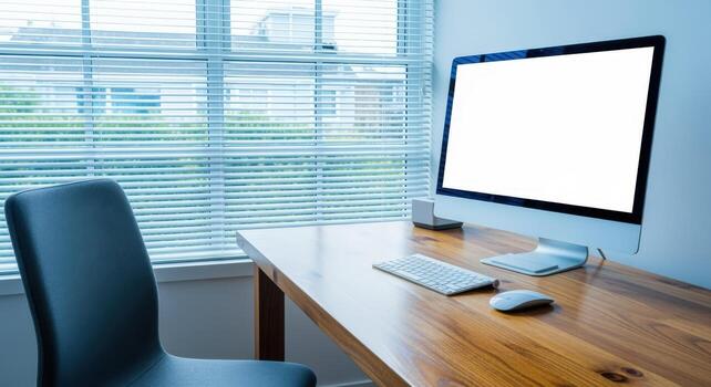 Minimalist Office Setup with Blank Computer Screen on Wooden Desk, Natural Light from Window photo