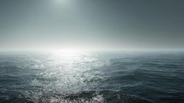 Serene Ocean View Calm Water, Sparkling Sunlight, and a Misty Horizon Creating a Peaceful Atmosphere photo
