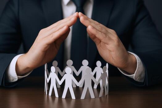 Protecting Team Business Professional Shielding Paper Cutout People in a Circle, Symbolizing Unity, Security, and Collaboration photo