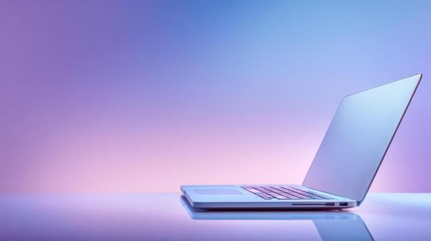 Sleek Laptop Displayed Against a Gradient Background, Ideal for Tech, Design, and Modern Business Concepts photo