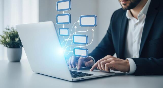 Businessman Using Laptop with Flowchart Overlay, Representing Business Processes and Workflow Automation Solutions photo