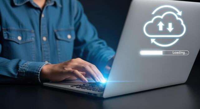 Cloud Computing Man Uploading Data to Cloud Server via Laptop for Business and Technology photo