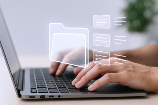 Data Management on Laptop Man Organizing Digital Files and Folders for Efficient Workflow photo