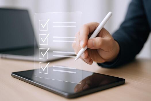 Digital Checklist Hand Completing Tasks on Tablet with Pen for Efficient Workflow and Productivity photo