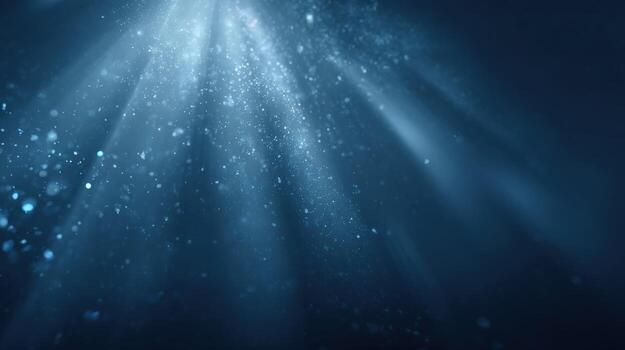 Underwater Light Rays Illuminate Deep Blue Sea, Creating Ethereal and Dreamlike Aquatic Scene photo