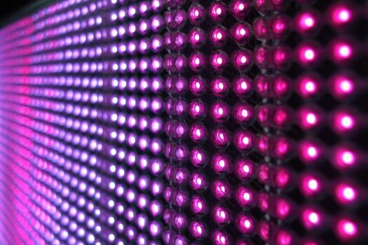 Close-up of a Bright LED Display Panel Showing Pink Color, Offering Vibrant Visuals and Modern Technology photo