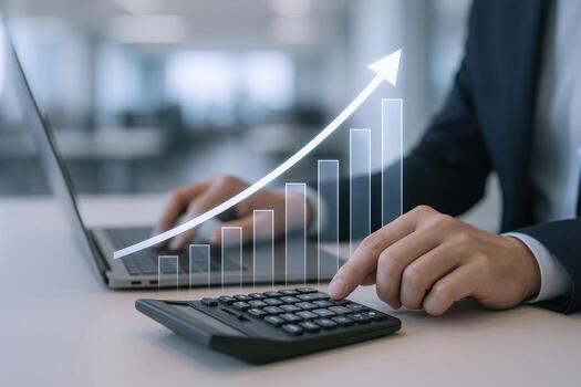 Business Analysis with Financial Growth Graph Overlay Man Using Laptop and Calculator for Investment Strategy photo