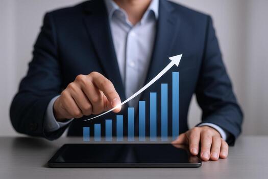 Businessperson Analyzing Growing Bar Graph and Arrow on a Tablet Display for Financial Success photo