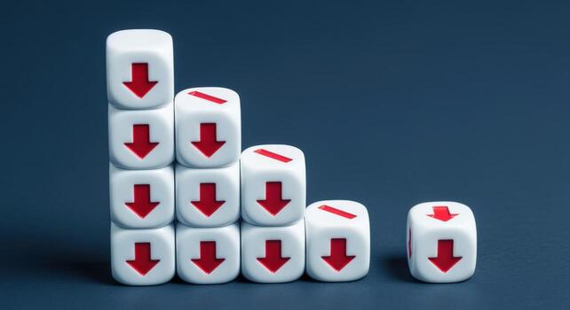 Declining Trend Indicated by Dice with Red Arrows on a Dark Background photo
