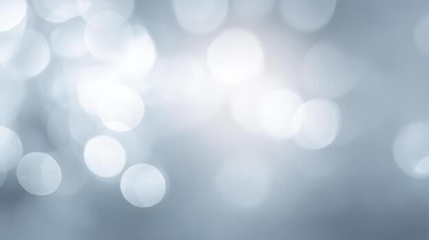 Elegant Silver Bokeh Background with Luminous Highlights for Festive Designs and Abstract Projects photo