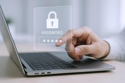 Entering Password on Laptop for Secure Access Protecting Data with Strong Authentication Measures photo