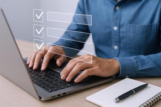 Man Completing Online Form on Laptop with Checkboxes, Representing Digital Surveys and Task Management photo