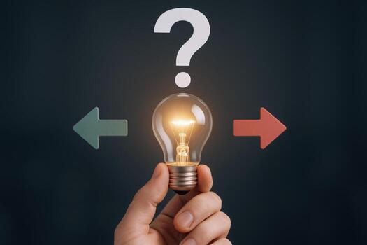 Decision-Making Concept Hand Holding a Glowing Lightbulb with Question Mark and Directional Arrows on Dark Background photo