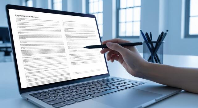 Online Form Completion on Laptop Hand with Stylus Filling Application, Digital Submission, Modern Workspace photo