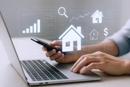 Real Estate Technology Hands Using Mobile Phone and Laptop with Digital House Graphics photo