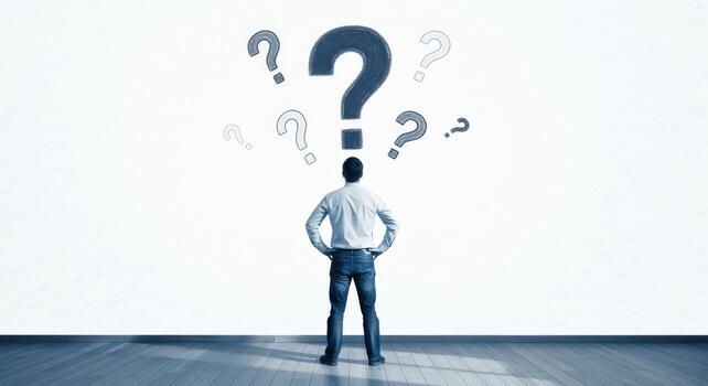 Puzzled Man Stands Before Question Marks, Depicting Uncertainty, Confusion, Inquiry, and Seeking Answers photo